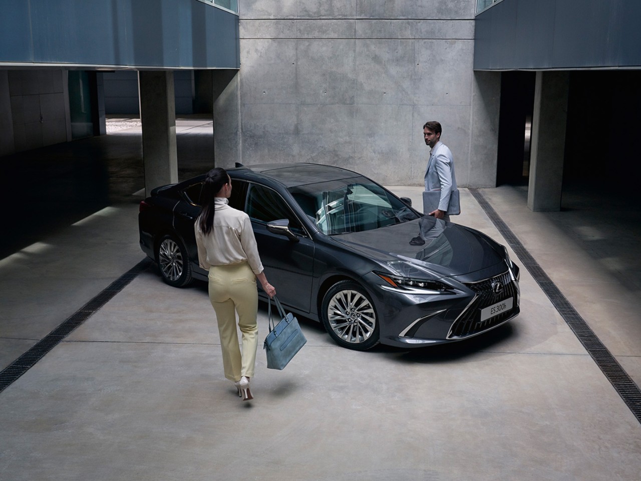 Rear view of a Lexus RZ driving 